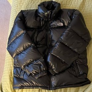 The North Face Black Full Zip Puffer Jacket with hidden hood. Mens Size XL.